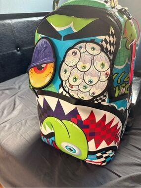 Sprayground Neon Multi-Color Graphic Backpack